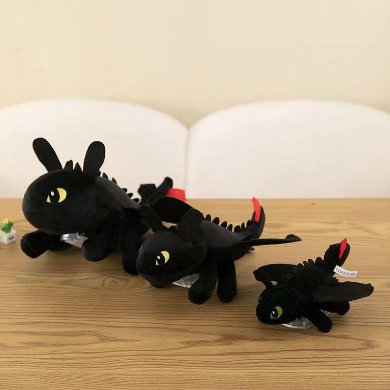 Helmet car suction doll motorcycle motorcycle ski decoration doll wings can move flying dragon