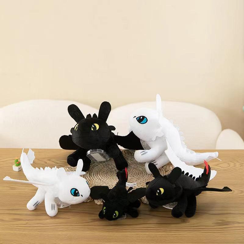 Helmet car suction doll motorcycle motorcycle ski decoration doll wings can move flying dragon