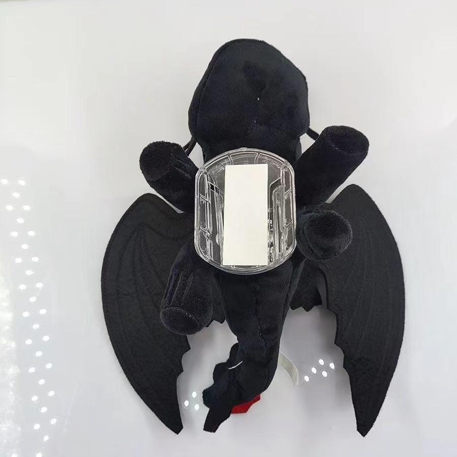 Helmet car suction doll motorcycle motorcycle ski decoration doll wings can move flying dragon